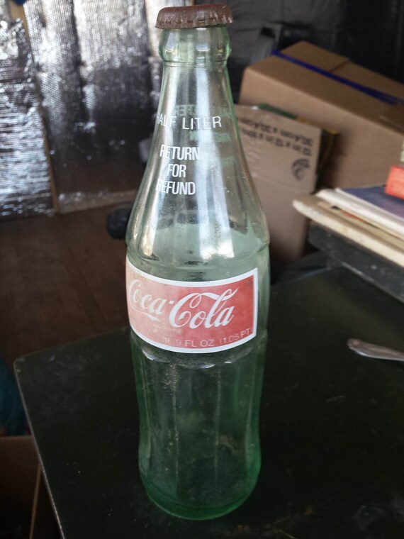 Metric Coke Bottle Return for refund