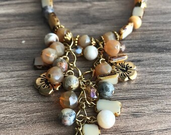 Czech glass, Gold hibiscus charms, golden colors N146