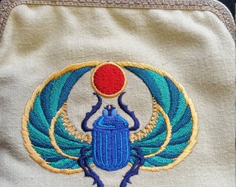 CP555. Coin purse with Egyptian scarab design.