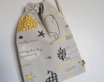 Bag in blanket patterned whale and fish in grey and mustard yellow