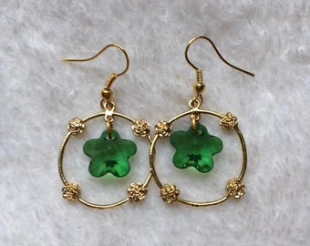 Gold plated earrings with green flower
