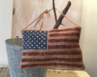 Burlap Door Hanger in Natural Burlap printed with American flag.
