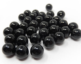 Thirty four black glass beads, diameter 1.1 cm, free shipping