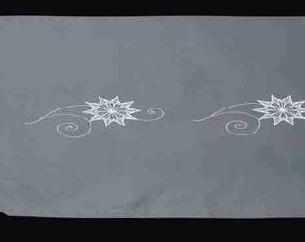 Very large table runner. To cover the entire length of a large table.