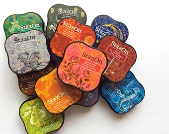 stazon ink pad. tsukineko staz on stamp pad. fast drying multipurpose solvent ink. plastic paper glass metal coated surface. choose one