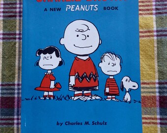 PEANUTS Charlie Brown Snoopy We Are Right Behind You, Charlie Brown Softcover Book Charles Schultz 1964 !st Printing