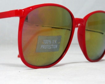 Lunettes de soleil rouge grand vintage des années 80 avec verres miroir