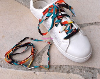 Shoe laces in yellow and red wax fabric