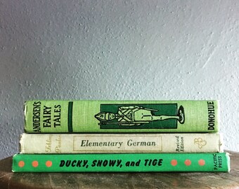 Set of three vintage green books
