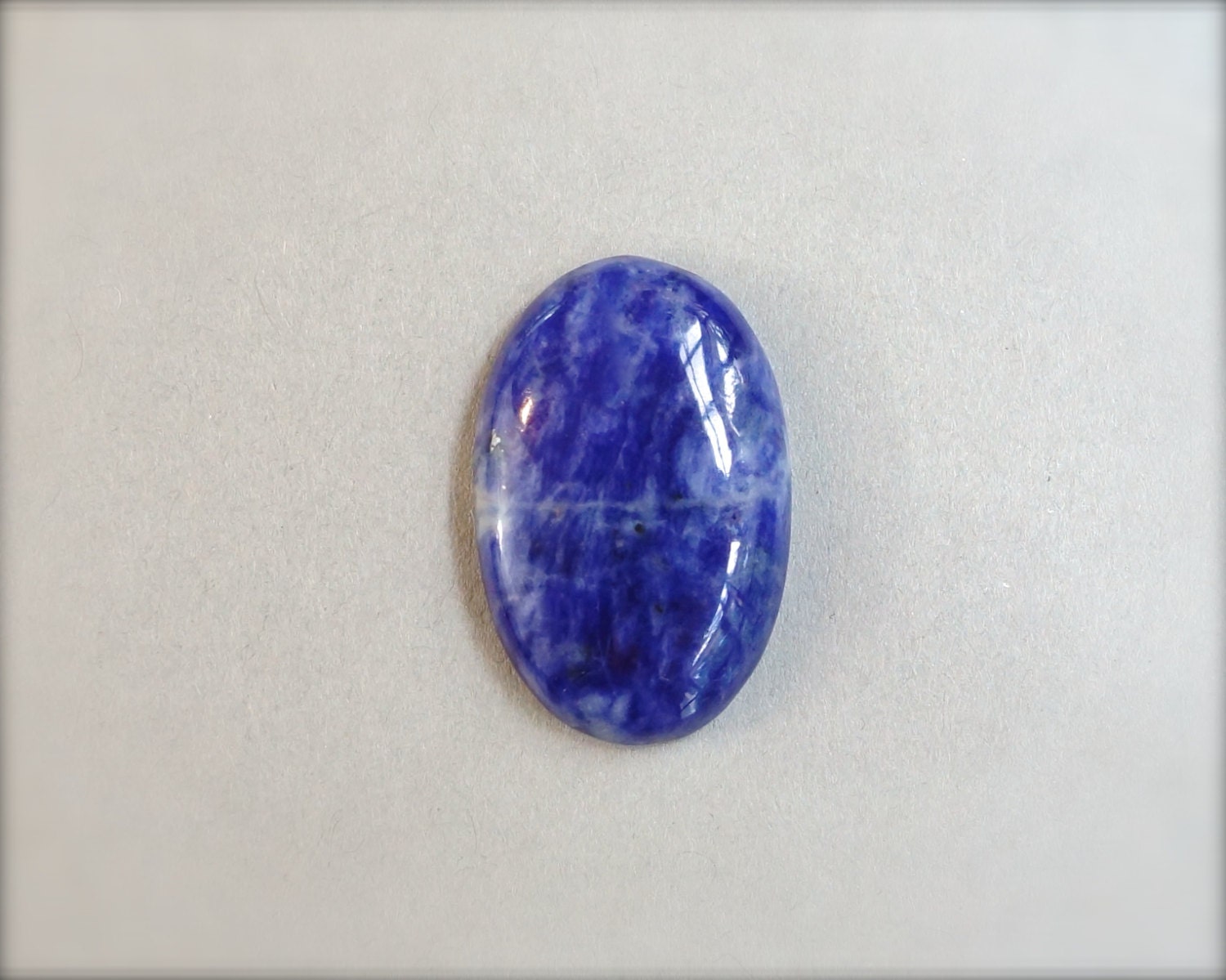 Sodalite cabochon. Navy blue gemstone cabochon.