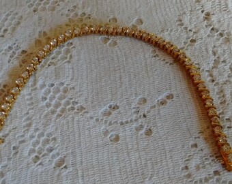 Tennis Bracelet: Rhinestone and Gold Metal