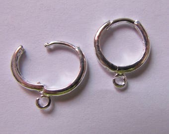pair of medium silver-tone earrings