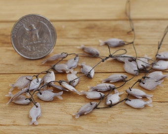 Miniature dollhouse . A bunch of fresh fish . In 1/12 scale