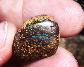 Drilled Koroit boulder opal pendant