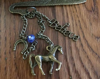 Bronze Horse and Horse Shoe on Ornate Antique Gold Finish Shepherd's hook Bookmark, Believe Charm and Blue Swarovski Crystal