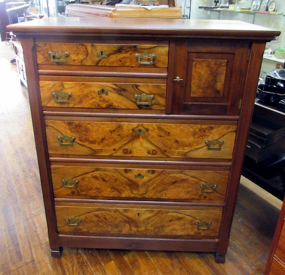 Antique tall dresser with burl wood
