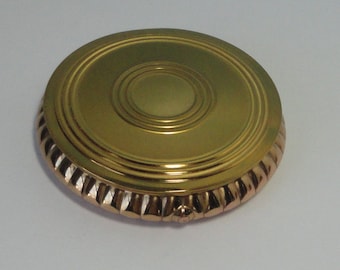 Gold tone metal Majestic Compact. Never used.