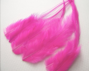 Neon feathers | Etsy