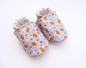 Sole leather baby booties and grey cotton top with hedgehogs