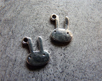 Silver plated rabbit charm. Set of 4