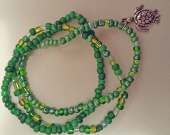 Green beaded bracelet stack
