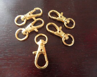 5 clips color lobster gold measuring 3 cm