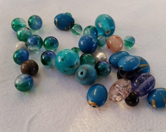 set of 33 blue and turquoise plastic beads