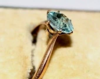 Antique rose gold and blue zircon solitaire ring