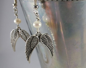 True Luster Of Genuine Pearls and Patina Wings In These Drop Earrings