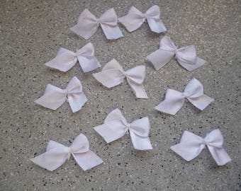 10 knots, white cotton appliques