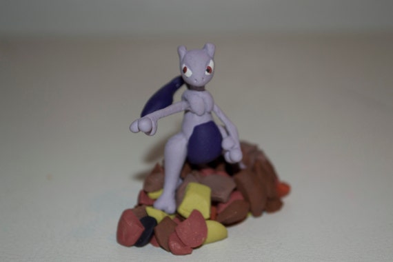 mew and mewtwo statue