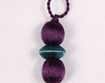 12 15x70mm, rayon, mauve and blue tassels (9652)