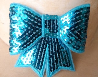 set of 2 8 x 8 cm turquoise sequin bows