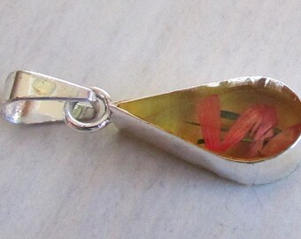 Sterling Silver Pendant with Orange and Green Fiber in Resin