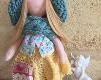 Hand made rag doll. With two full of clothes.