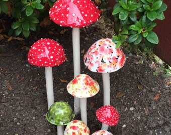 Eight hand crafted ceramic mushrooms, 1 extra large, 2 large, 1medium, 4 small, plant stakes, garden art, mushroom stake