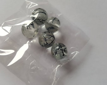 Set of 5 black and transparent glass beads. (8013012)