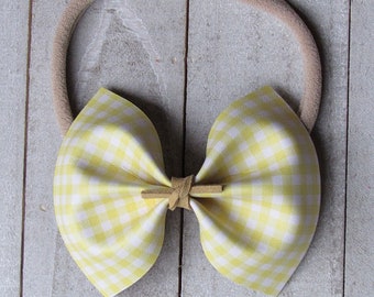 Yellow gingham faux leather bow