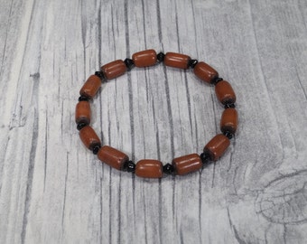 Palm seed bracelet brown black elastic