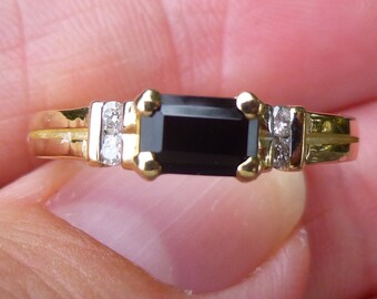Yellow gold 14KT....Onyx and diamond ring.....I love Diamonds and Onyx....such a cool combo