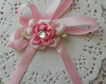 Pink satin bow with 2 shades of pink and flower rhinestone in the Center 7,00 cm in height
