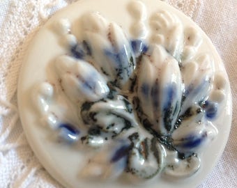 Large vintage cabochon, a relief decoration, porcelain