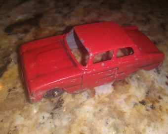 Red tootsie toy car made in chicago