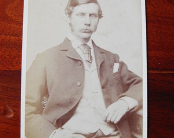 Carte de Visite of a man with moustache, sitting 1880