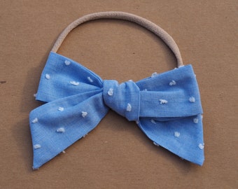 Chambrey swiss dot oversized bow