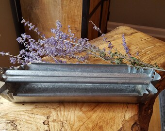 Vintage galvanized chicken feeder