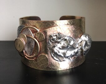 Handcrafted abstract design cuff