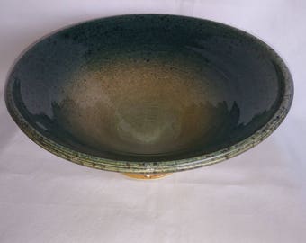 Green and yellow porcelain bowl