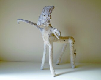 Half man half - uniquely weathered Driftwood character