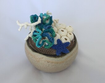 Crochet coral reef in a pot